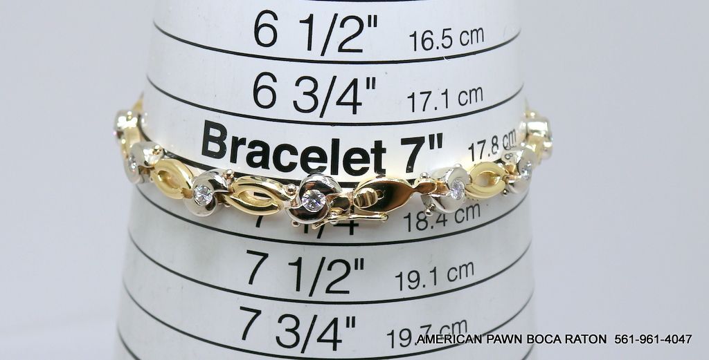 14K Two Tone Gold Swirl and Oval Link Diamond Bracelet tcw