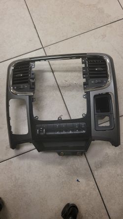 13-18 Ram 1(contact info removed) Instrument Panel radio bezel