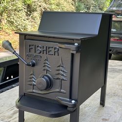 Fisher “baby bear” wood stove (delivery available)