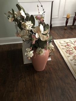 Peach and Green flower arrangement in vase.