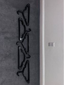 Moving out sale. Set of 50 cloth hangers