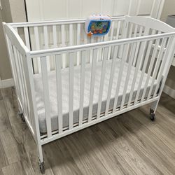 Full Size White Folding Crib