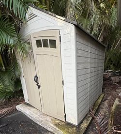 Resin plastic shed 7x7. Already taken apart.