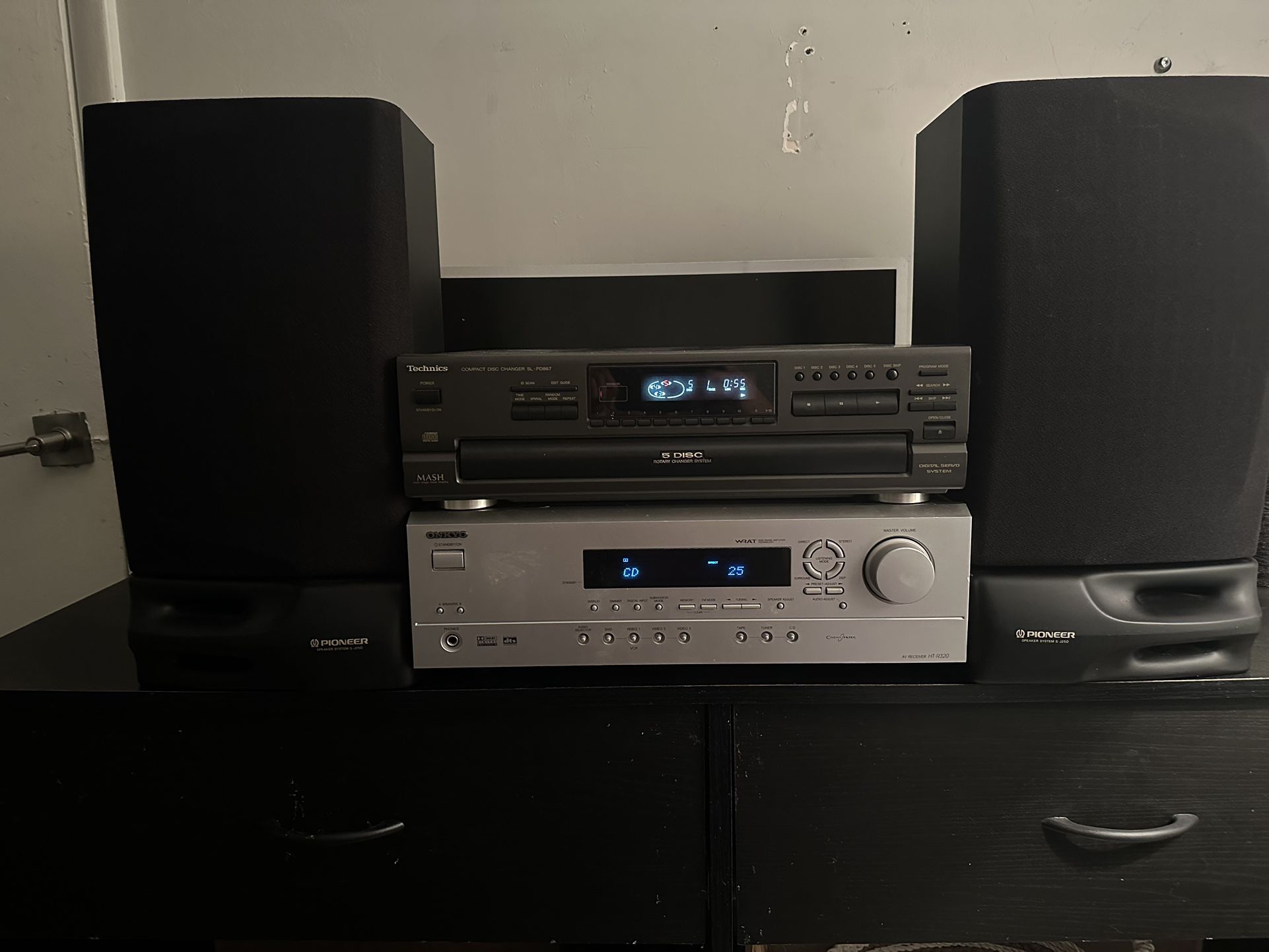 Onkyo Av receiver htr320 , and technics compact disc charger sl-pd867. Pioneer s-j25d speakers 