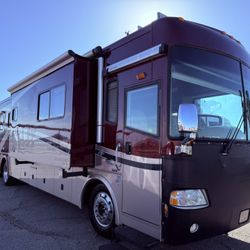2005 country coach 40ft CAT diesel pusher. 400hp 3 slide outs.
