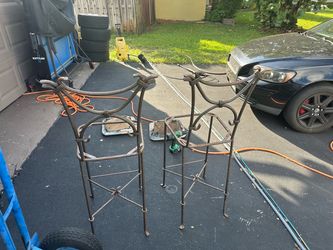 Allexandria Diez expensive heavy wrought iron high top chairs