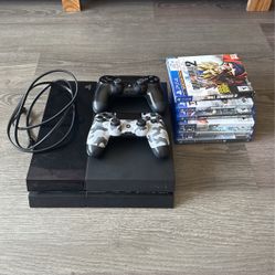 PS4 w/ 2 Controllers And Games