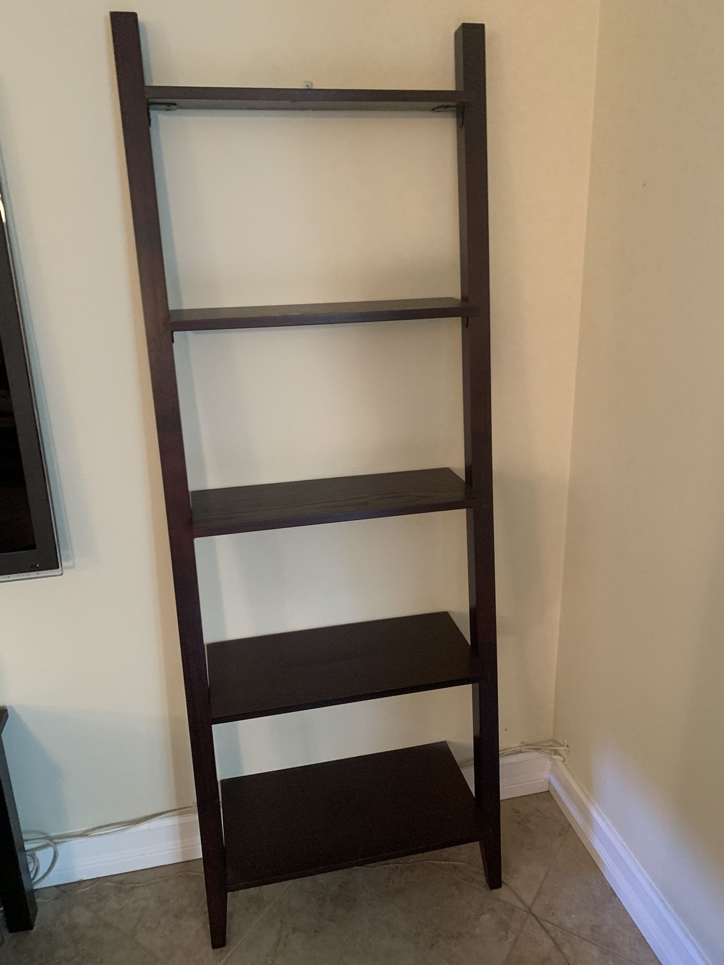 Espresso colored ladder shelves and tv console