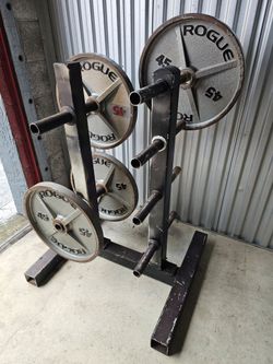 4 Rogue 45LB Machined Olympic Weight Plates. Homestead 33033. Delivery fee.

Heavy-duty cast-iron Rogue 45lb machined Olympic weight plates come in a 