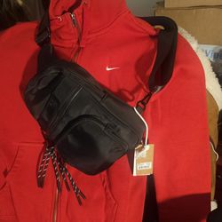 Black nylon sling crossbody bag, similar in style to the MZ Wallace Crosby bag $40