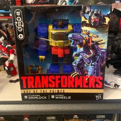 Transformers: Age of the Primes Leader Class G2 Universe Grimlock Action Figure with Autobot Wheelie