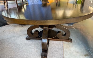Round Wood Dining Table with Scroll Pedestal Base