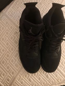 black cat Jordan 4’s