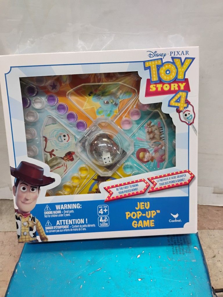 Disney Pixar Toy Story 4 Pop-Up Game by Cardinal. It is a board game for 2 to 4 players,
