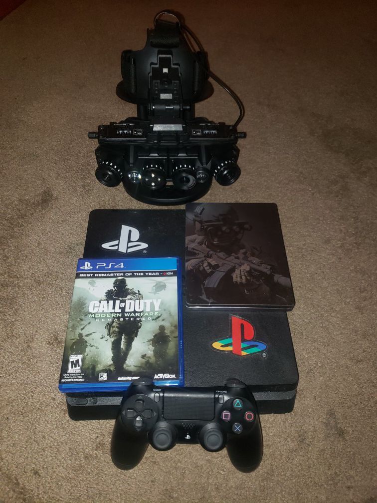 PS4 with 2 games and goggles