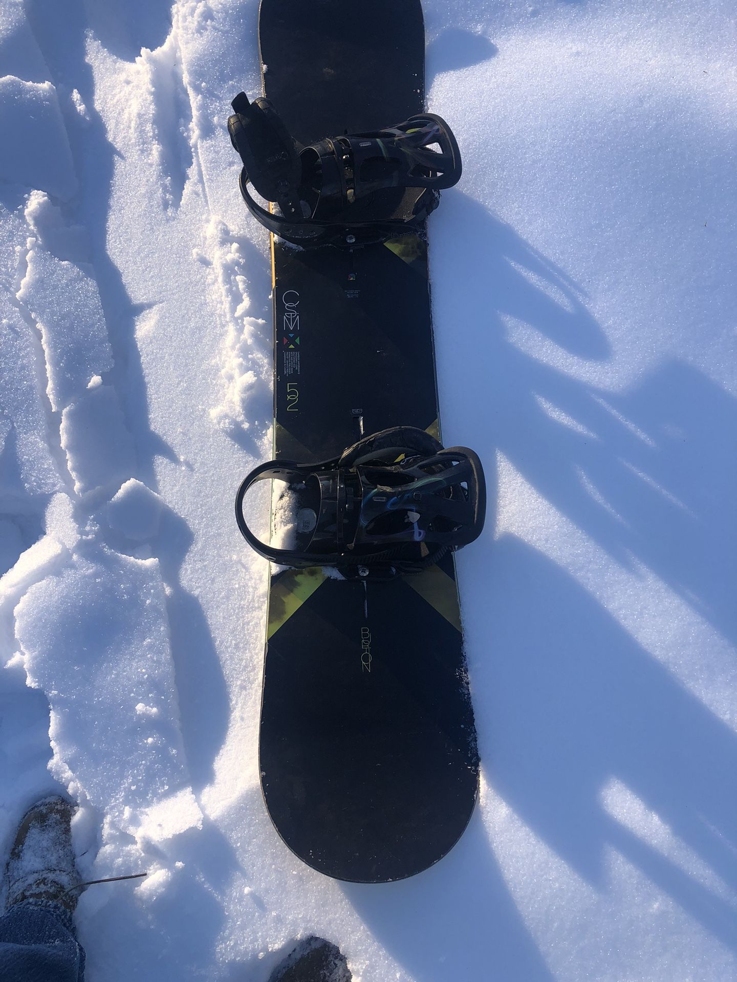 Burton custom 52 snowboard With bag and glasses.