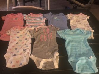 Newborn onesies some never worn some worn once