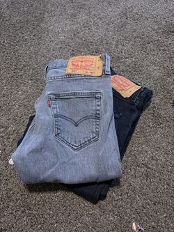 2 pairs of levi jeans