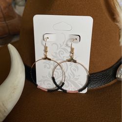 Rose gold and black hoop earrings