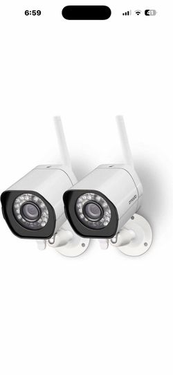 Zmodo ZP-IBH15-S 720p HD Outdoor Wired Security Camera featuring a white finish and a built-in cable.