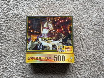 Colorluxe 500-piece jigsaw puzzle featuring a carousel horse in Seattle, Washington