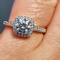 1 Carat Moissanite 18kt White Gold Plated Sterling Silver Ring.