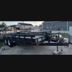 18’ by 6’10” equipment tailer clean title 10,000 pound GVW with removeable homemade stake railings