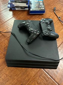 Ps4 Pro 1TB w/2 controllers and a ton of games