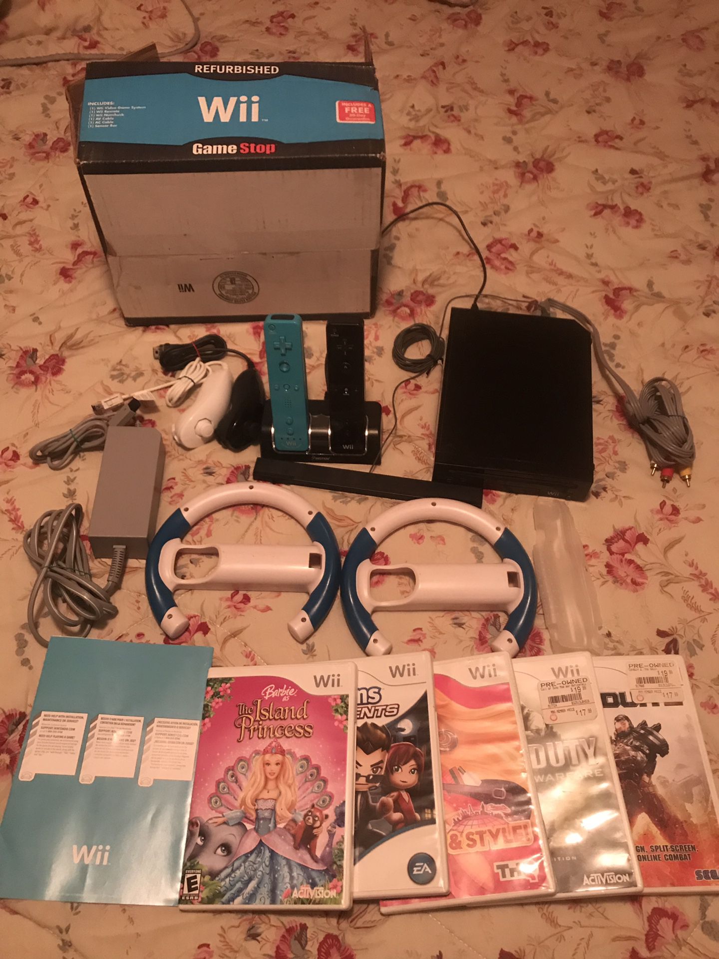 Wii Comes with accessories & aAC Adapter & box . Works great
