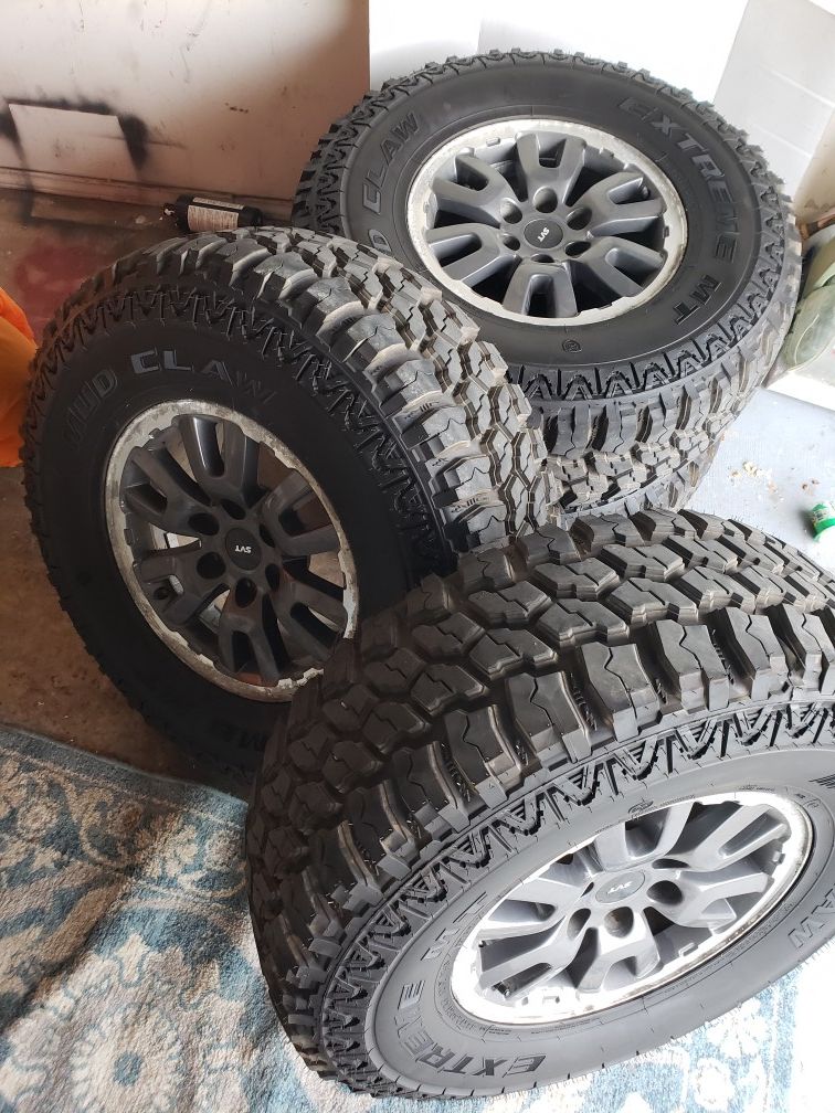 Ford F-150 SVT Raptor wheels and NEW 35x12.50R17 *trade for a set of 20" 33's or 35's*