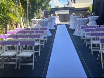 Cocktails tables , resin chairs , tablecloth