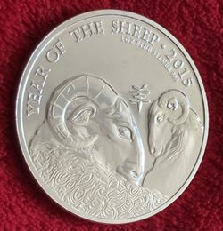 2015 YEAR OF THE SHEEP 1 OZ SILVER COIN ‼️ Have Light Milk Spots - See Picture For Details ...