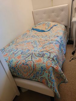 Twin bed with mattress