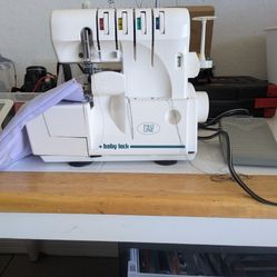 Machine , Mero , The picture shows a Baby Lock Pro Line sewing machine.