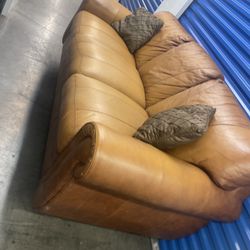Comfortable Leather Couch ( free delivery)