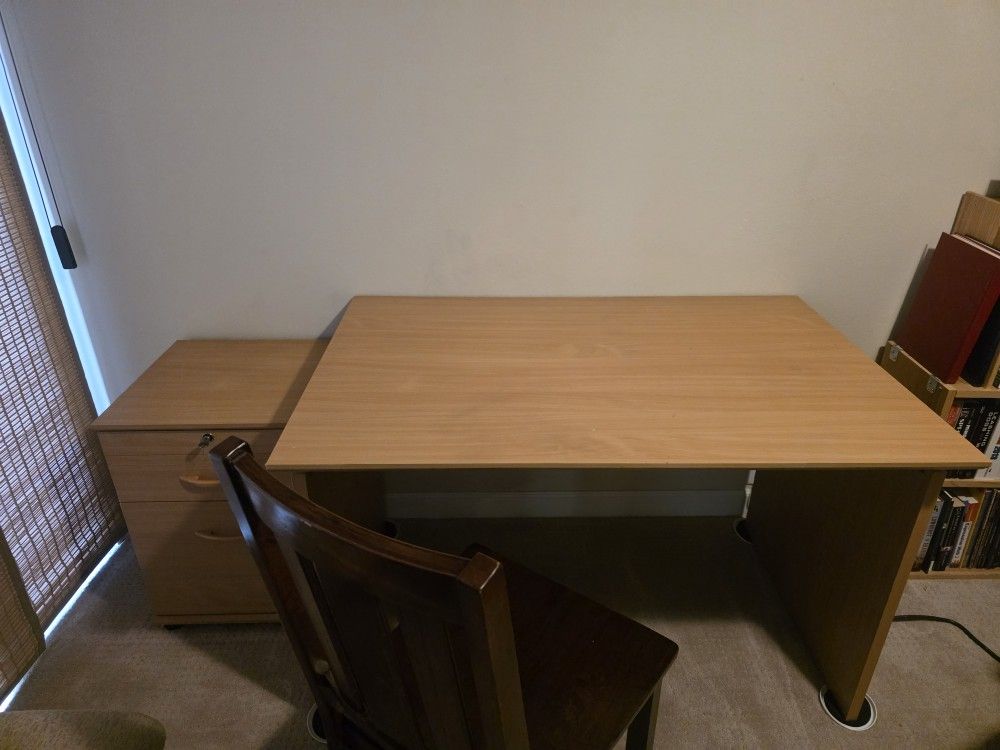Desk With Matching File Cabinet And A Chair.