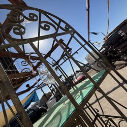 Spanish Revival Vintage wrought iron cage shape wine rack