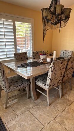 Marble table with 8 chairs