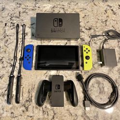 Nintendo Switch Works Great Blue And Yellow Controllers 