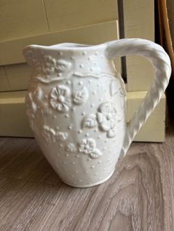 White Ceramic Pitcher with Floral Relief