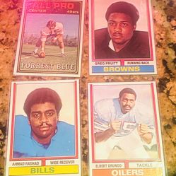 Lot of (4) 1974 Topps Football w/ AHMAD RADHAD RC Cards