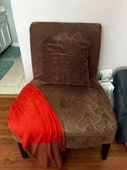 Brown cushion chair