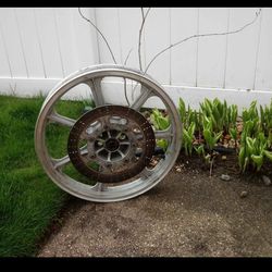 Kawasaki vn750 front rim and rotor..with axle and spacers