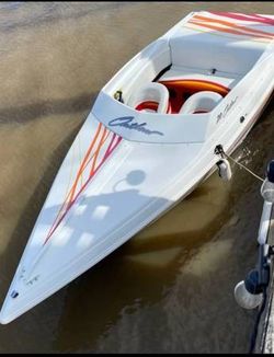 98 20ft BAJA OUTLAW SST FACTORY 5.7 MERC FACTORY PERFECT MAY TRADE FOR HARLEY DAVIDSON FREEWHEELER TRIKE OR ULTRA TRIKE 