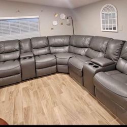 End Of Summer Clearance Sale. Madrid Gray Leather Reclining Sectional Only $1499. Easy Finance Option. Same Day Delivery.