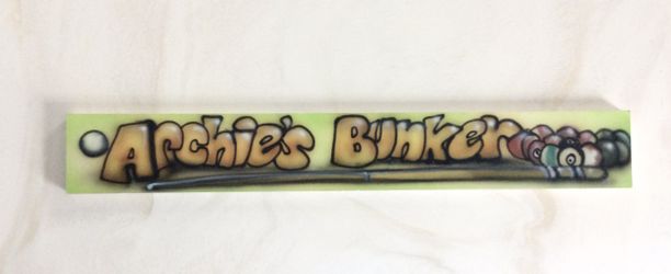 Homemade Billiards Sign reads: “Archie’s Bunker”
