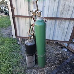 5', Gas, 3' Acetylene Tanks (Bought New, Both Bottles), Has Cutting Torch, Rose Bud, Welding Tip All For 850 Or Best Offer. 