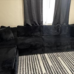 L-Shaped Couch – $800 (Includes FREE Rug & Pillow!)