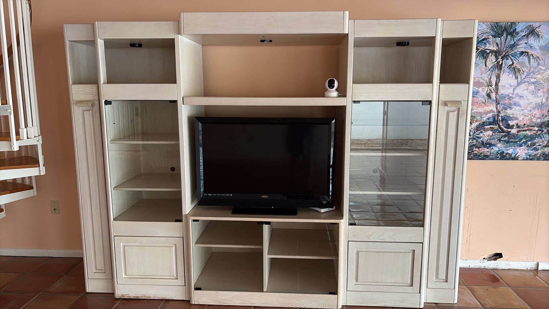 Wall Unit Includes Television