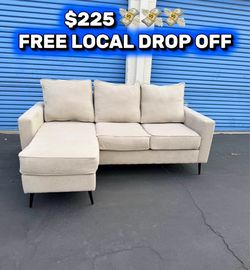 Beige L shape couch flippable L part and removable covers washed and clean FREE LOCAL DROP OFF